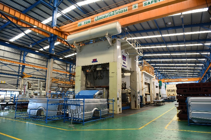 CNC Group press shop — 2,700-ton press line area with 20-ton overhead crane